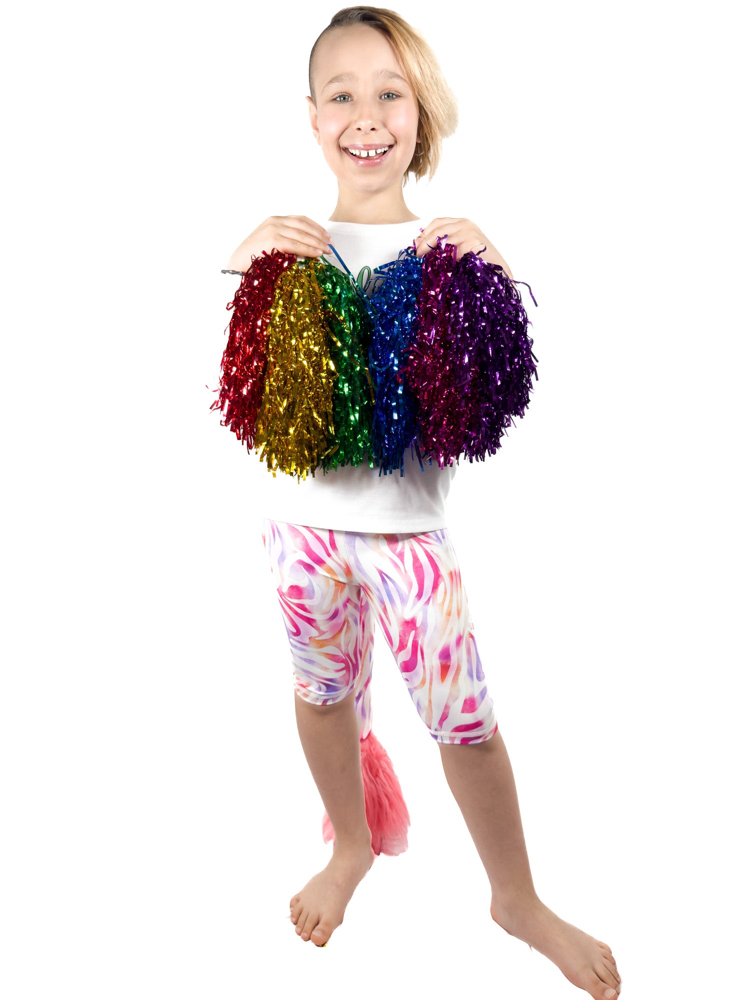 Girl with pom-poms wearing Tailys, girls shorts, pastel zebra leopard print leggings tail pants.