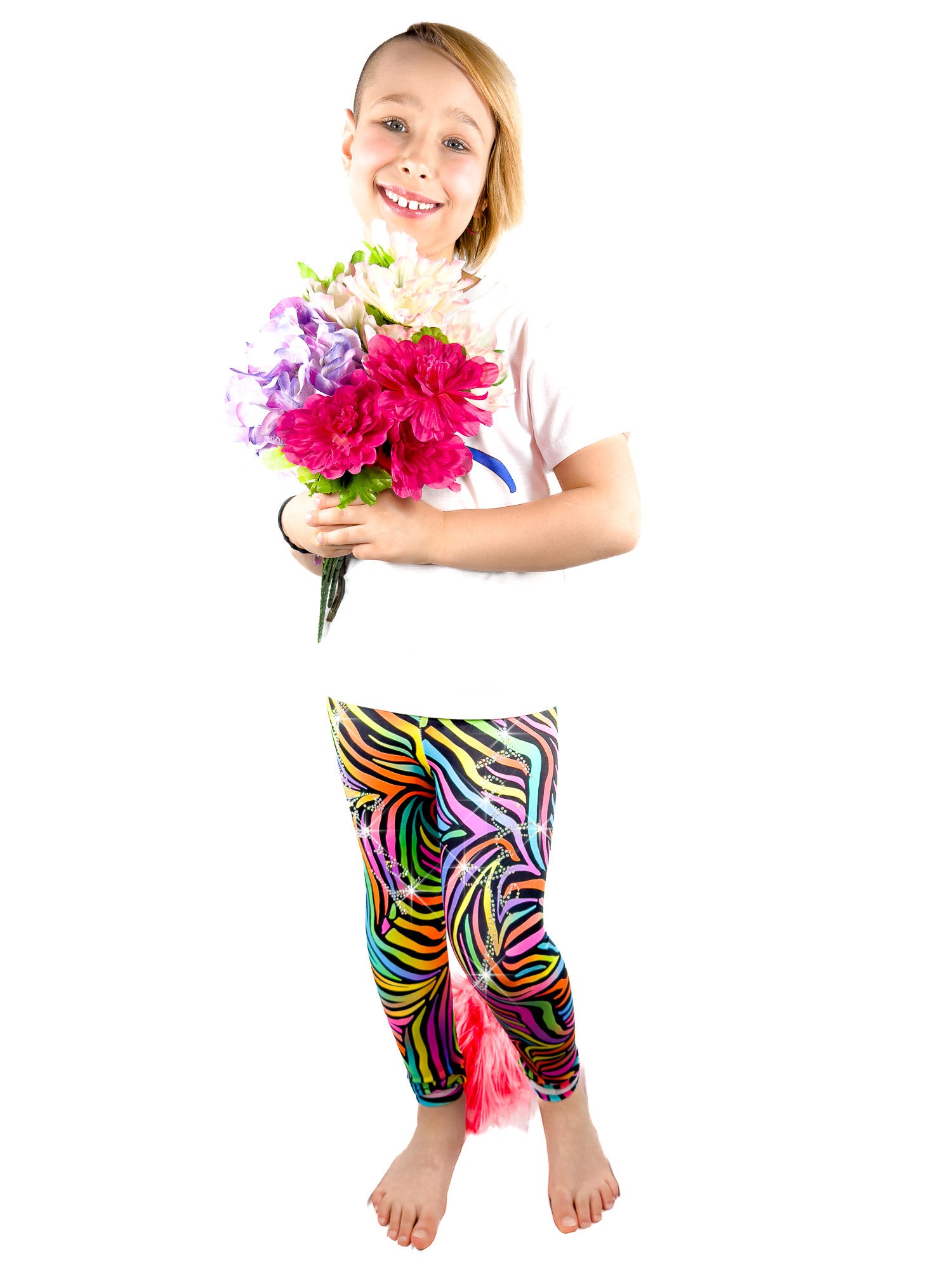 Girl with flowers wearing Rainbow Zebra Leggings Rhinestone tail pants by Tailys.