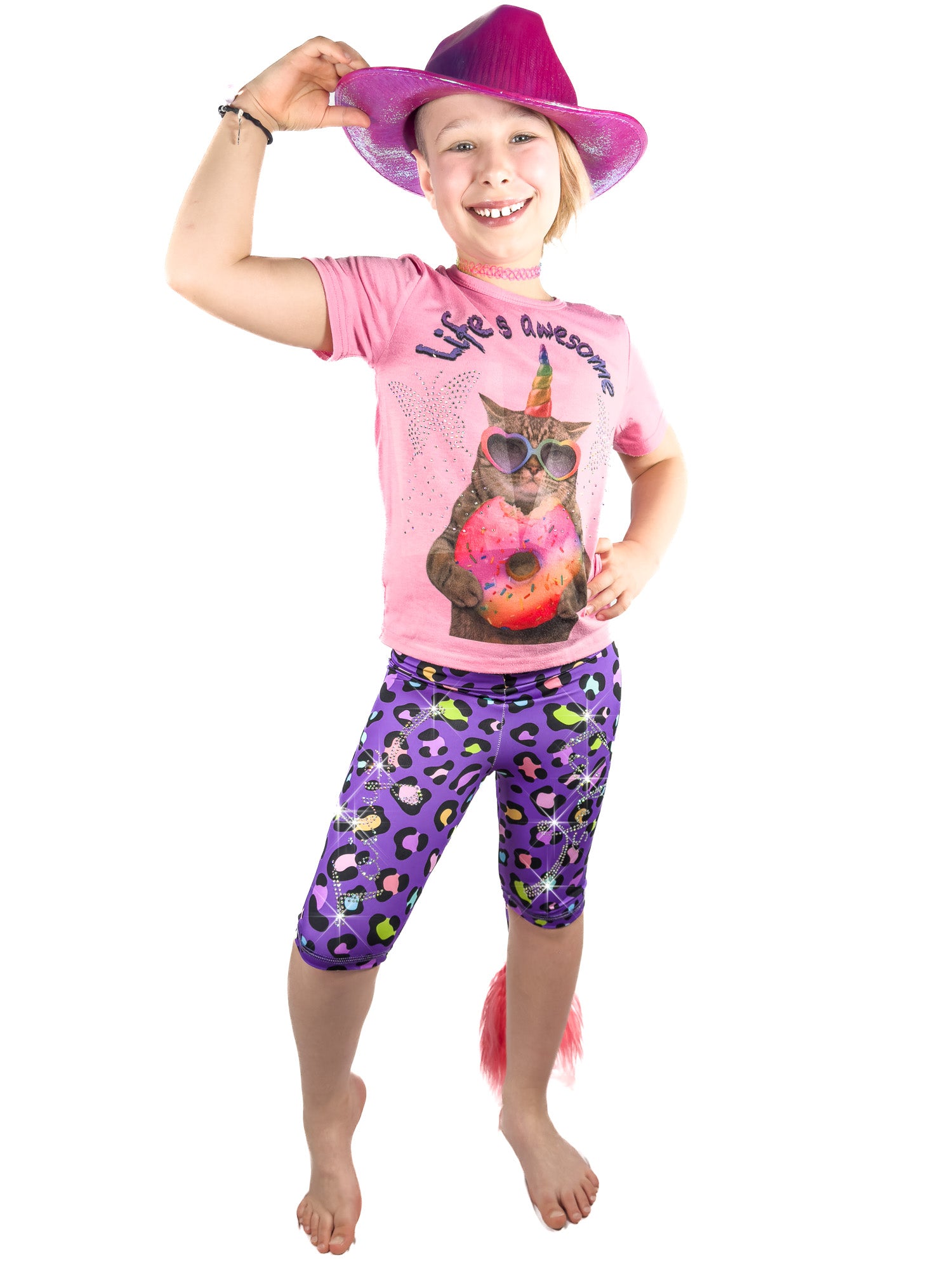 Girl with hat wearing Tailys sparkly rhinestone shorts for girls purple leopard print leggings tail pants.