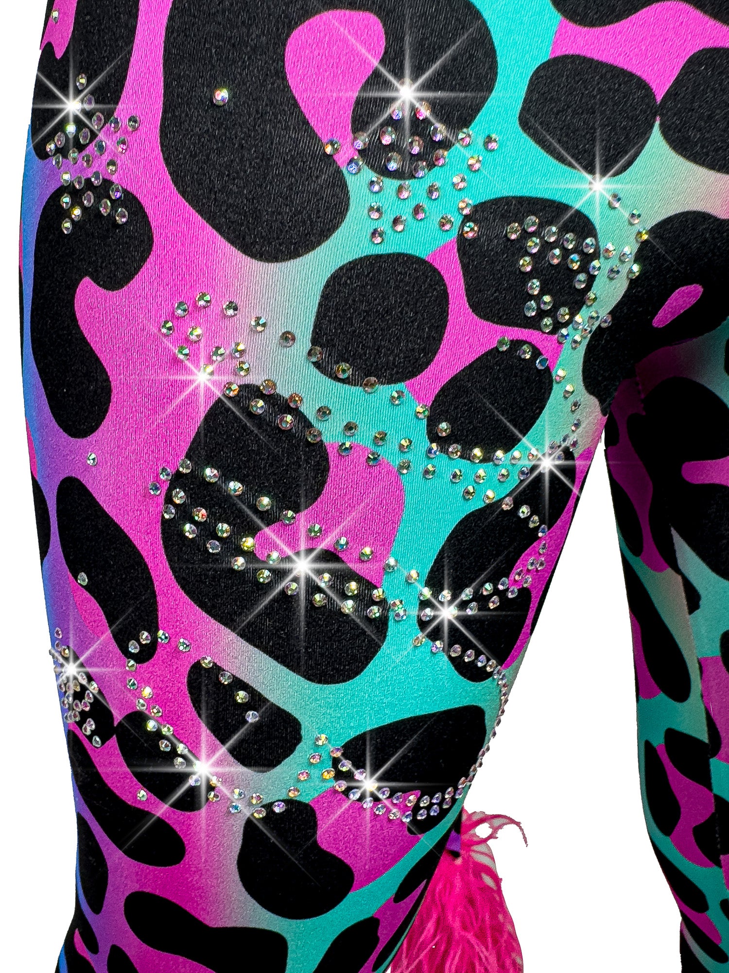 Fully personalized gift rhinestone design on leg of rainbow leopard leggings.