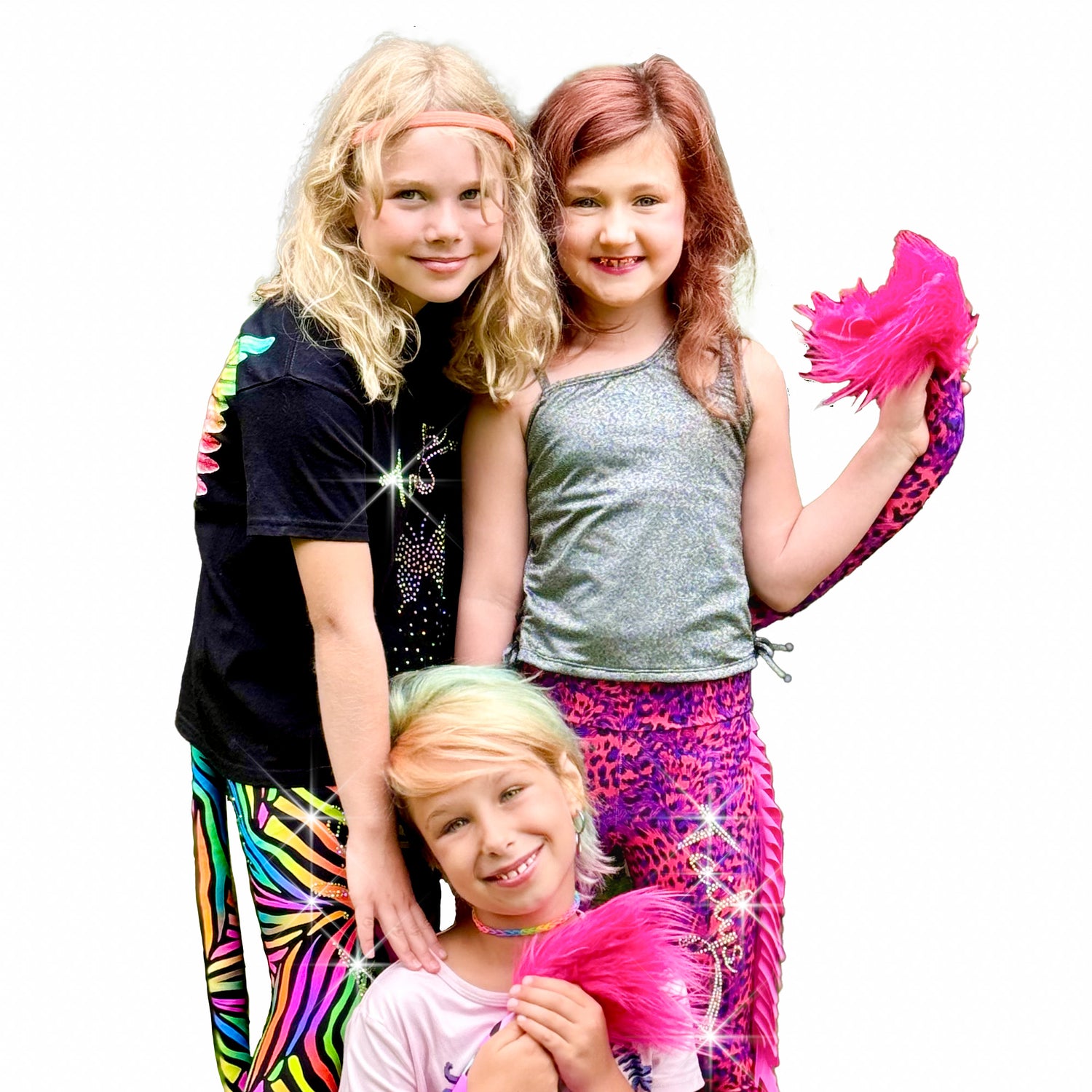 Three girls wearing animal print leggings with tail and rhinestones by Tailys.