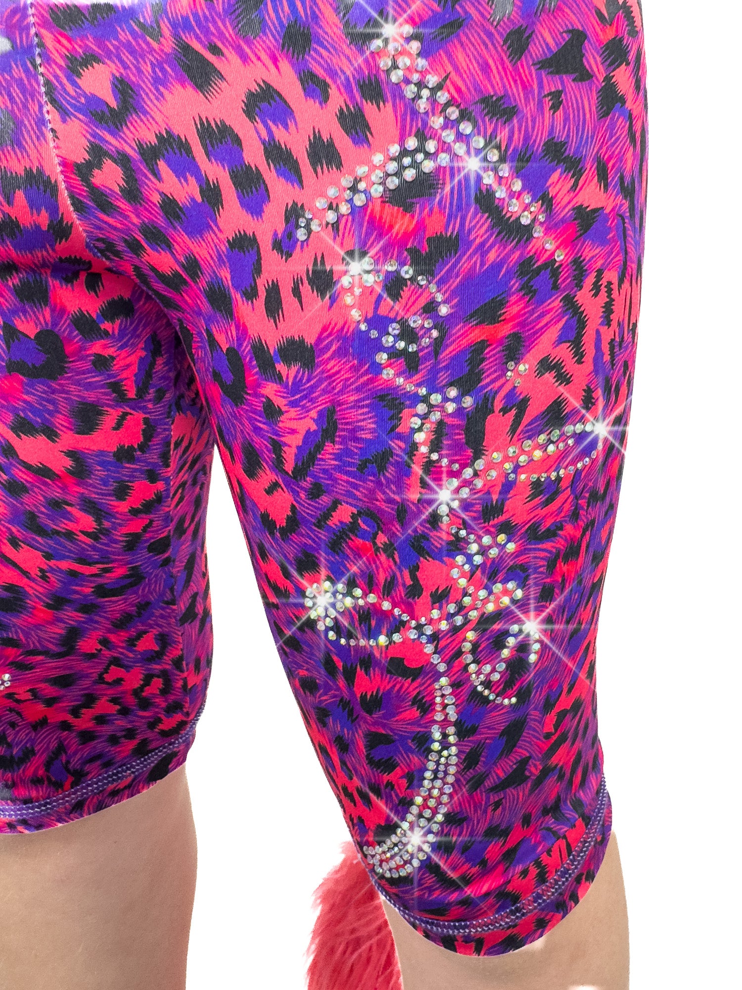 Close up front view of  blue and red leopard shorts, leggings with sparkly rhinestones and a tail.