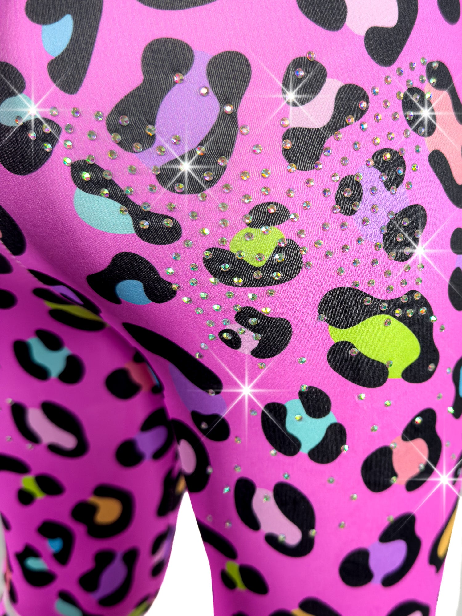 Close up back view of Tailys sparkly rhinestone shorts for girls leopard print pink leggings tail pants.