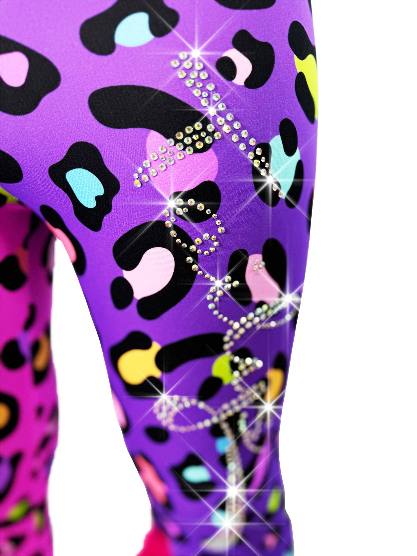 Detailed front view of Tailys two tone leggings girls tail pants, pink and purple Cheetah print fabric with rhinestones.