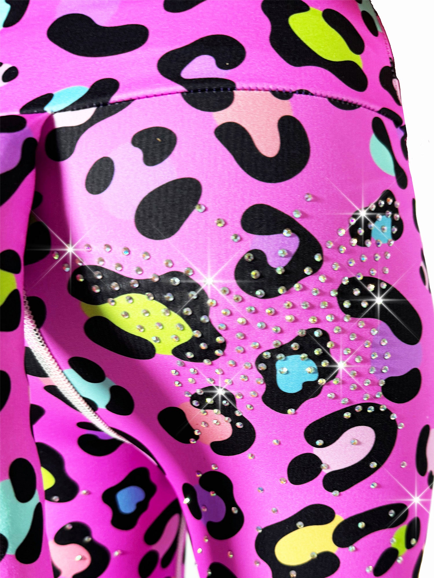 Detailed back view of Detailed back view of Tailys custom yoga pants legging, pink leopard fabric, with a tail and sparkling rhinestones
