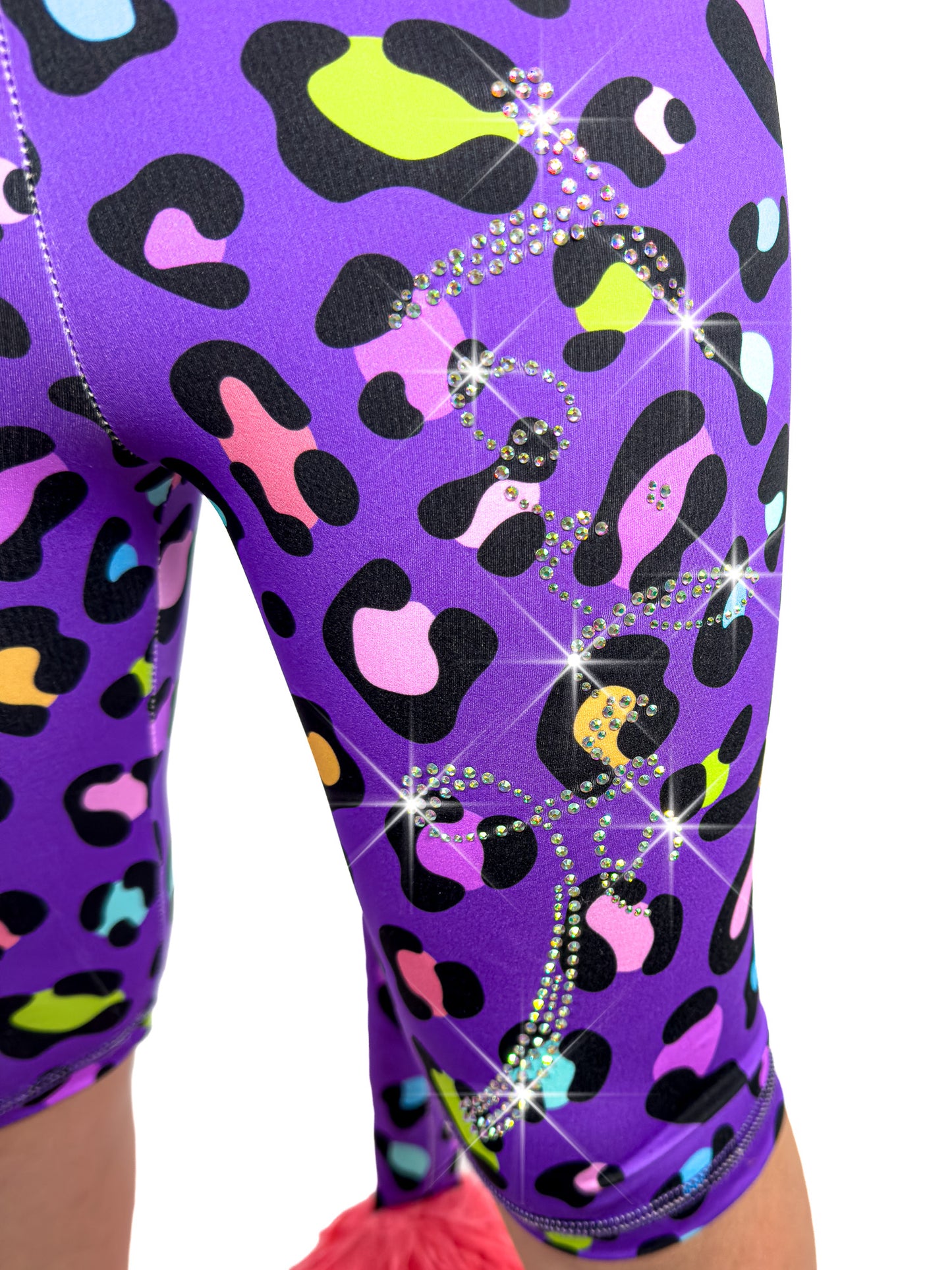 Close up Front view of Tailys sparkly rhinestone shorts for girls purple leopard print leggings tail pants.