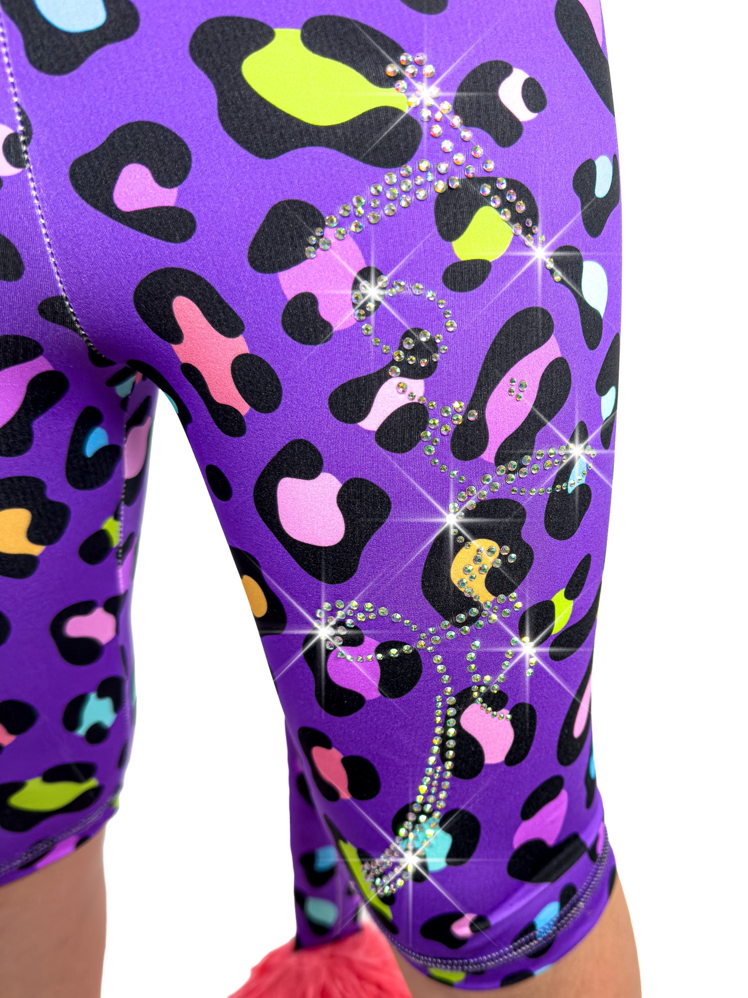 Close up Front view of Tailys sparkly rhinestone shorts for girls purple leopard print leggings tail pants.