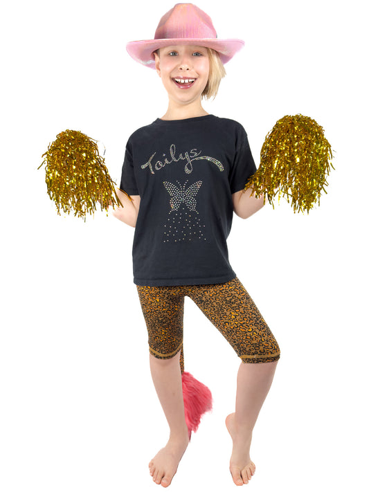 Girl with pom-pom wearing Tailys shorts for girls, brown cheetah print leggings tail pants.