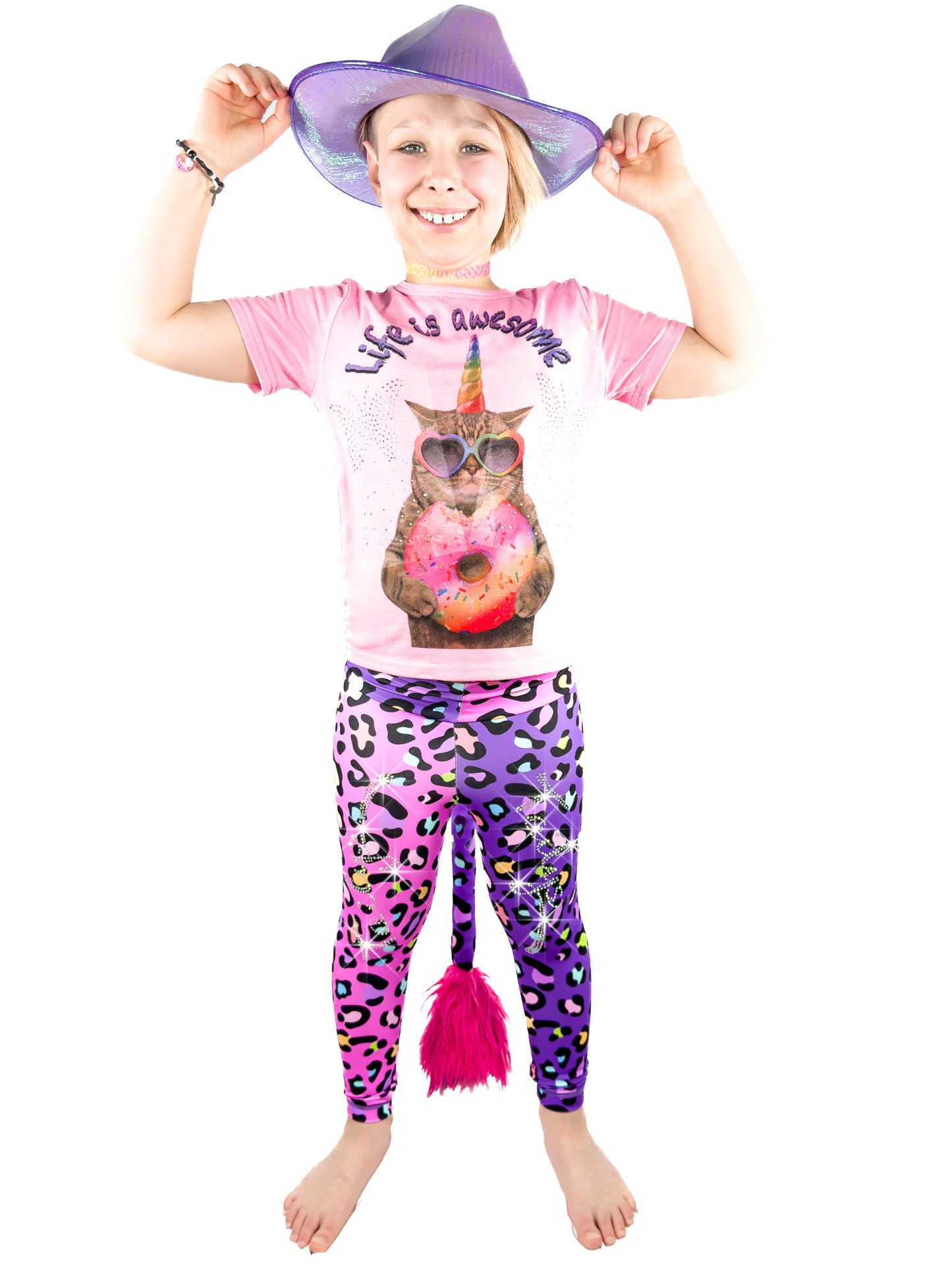 Girl wearing Tailys two tone leggings tail pants, pink and purple Cheetah with rhinestones.
