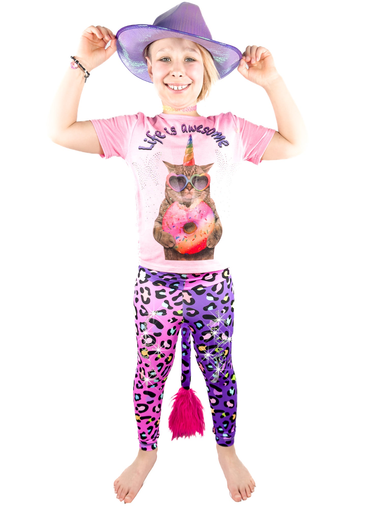 Girl wearing Tailys two tone leggings tail pants, pink and purple Cheetah with rhinestones.