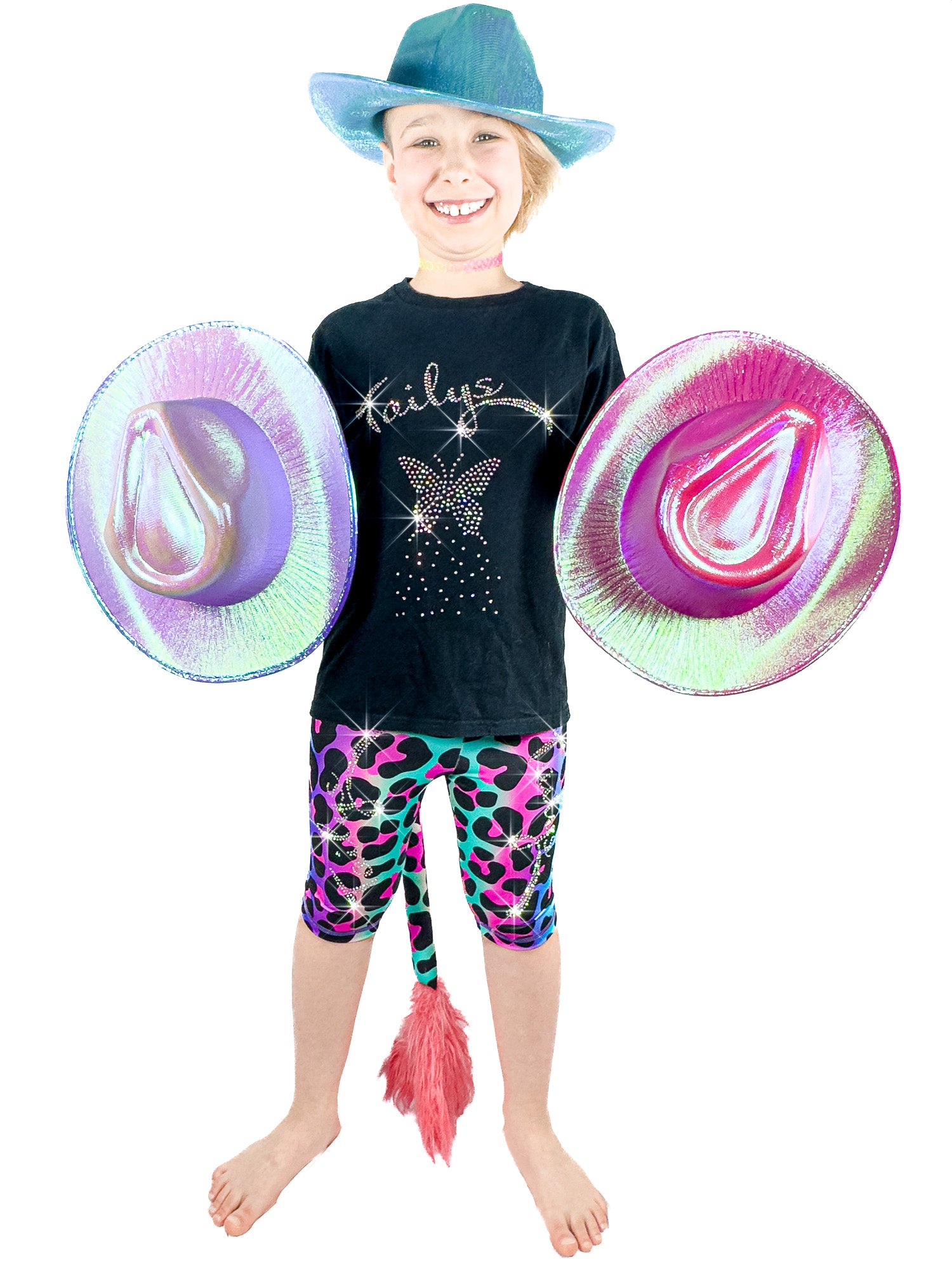 Girl with many hats wearing Tailys sparkly rhinestone shorts for girls rainbow leopard leggings tail pants.