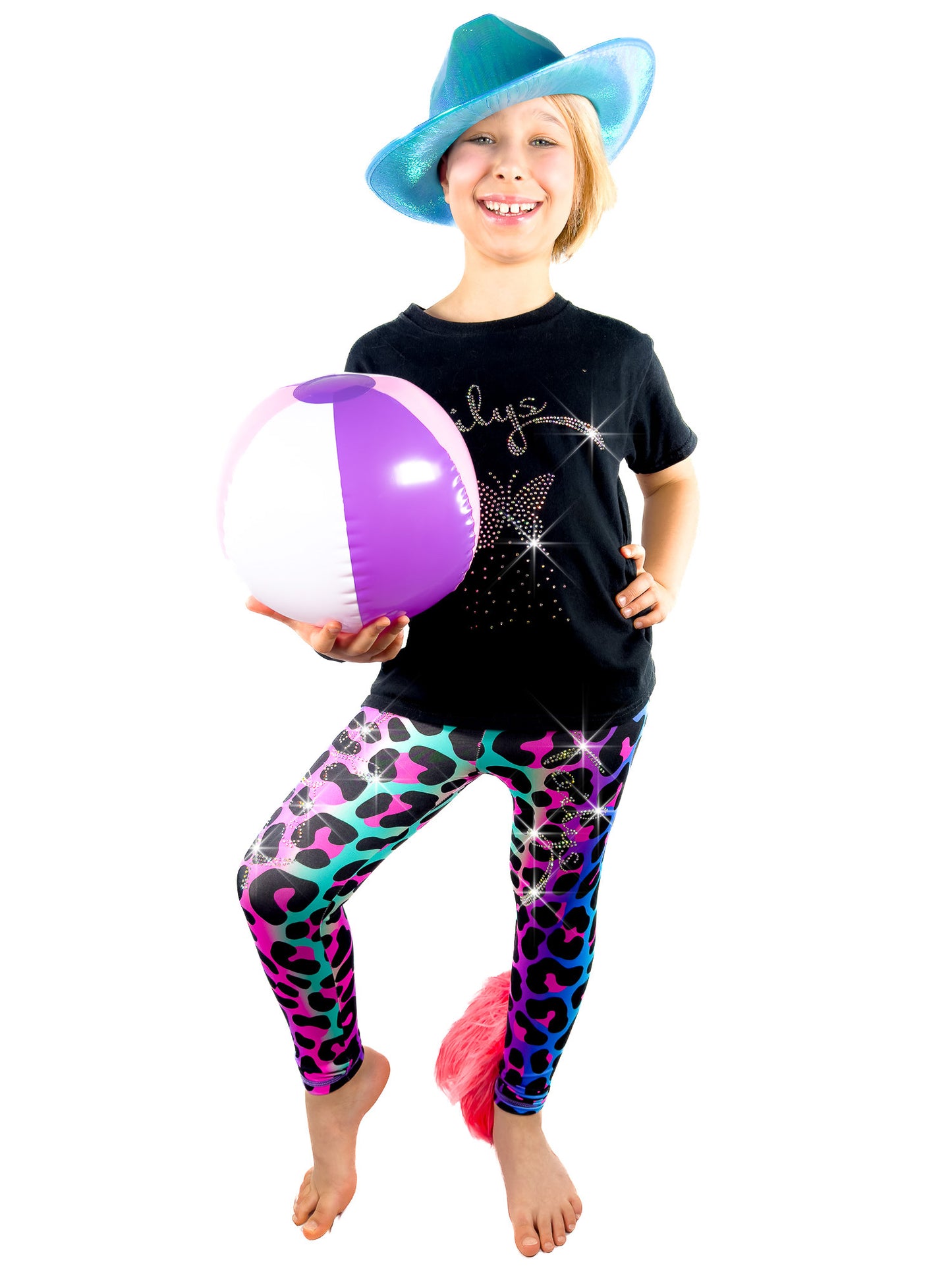 Girl with ball wearing Rainbow Leopard Leggings Rhinestone Tail Pants by Tailys.