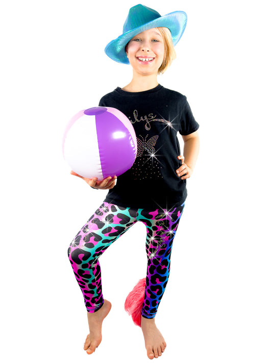 Girl with ball wearing Rainbow Leopard Leggings Rhinestone Tail Pants by Tailys.