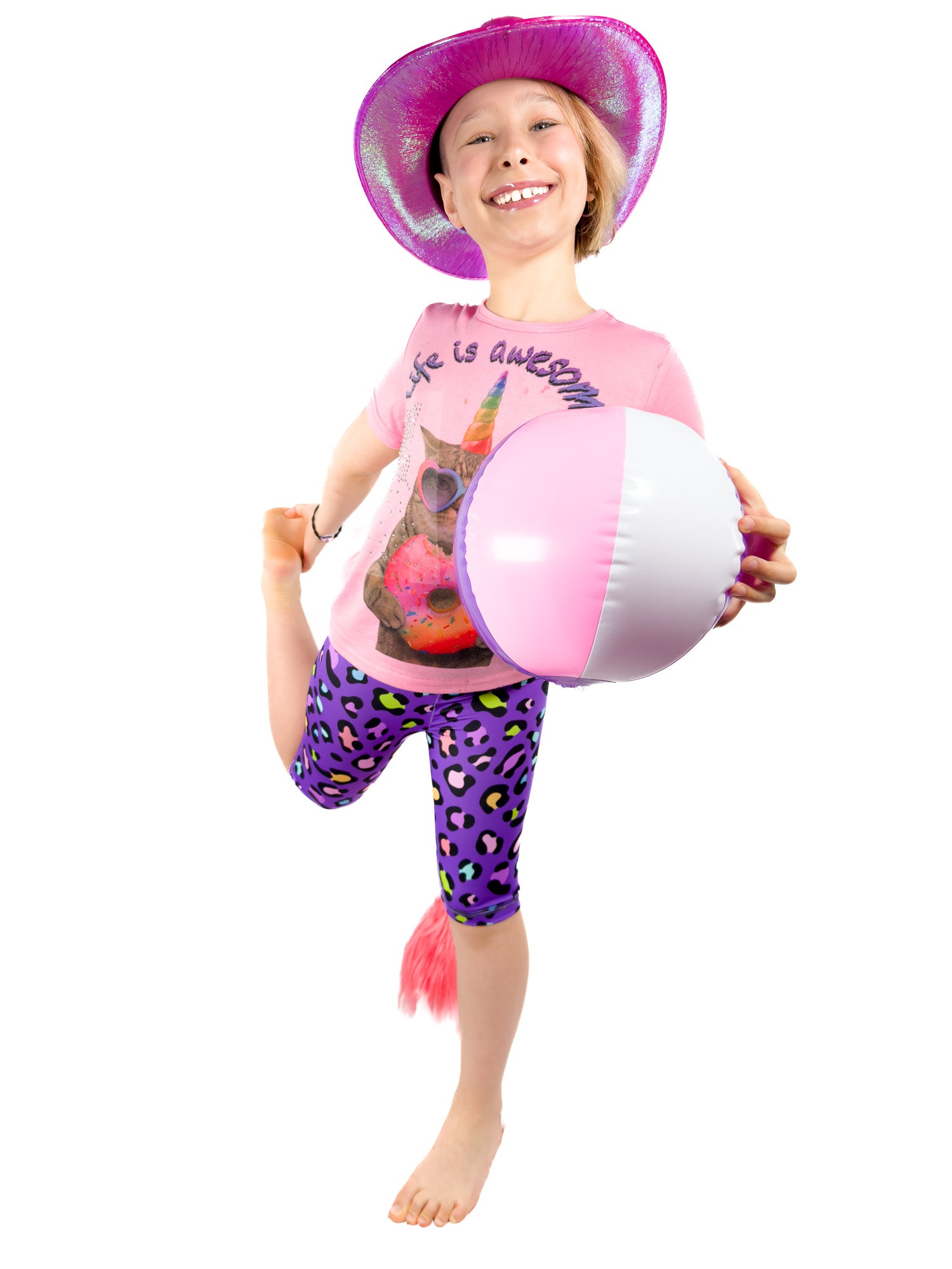 Cute girl with hat wearing view of Tailys cute shorts for girls purple leopard print leggings tail pants.