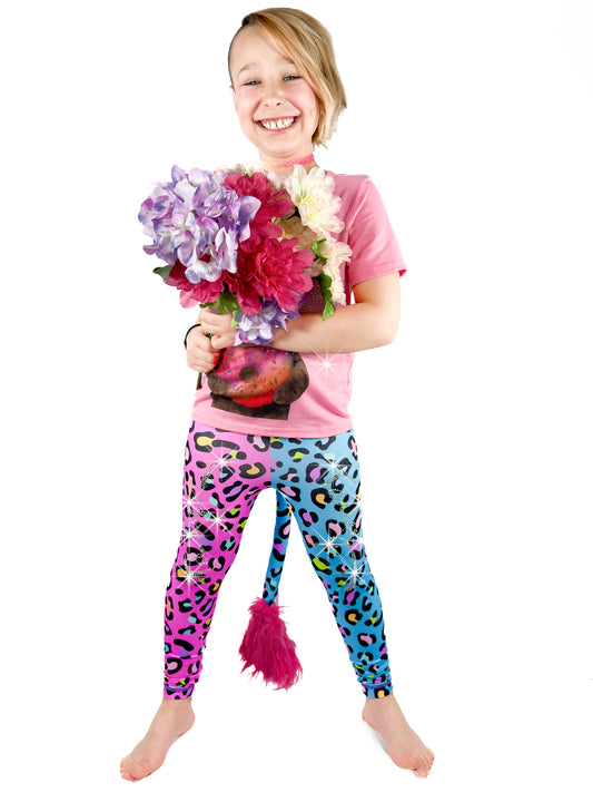 Girl with flowers in two Tone Pants Girls with Tail Pink and Blue Cheetah leggings, with rhinestones.