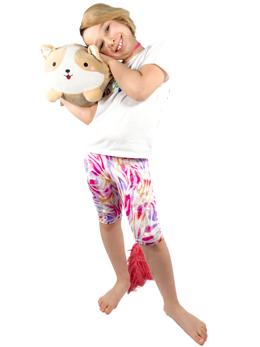 Cute girl, hugging toy, wearing sparkly rhinestone pastel zebra shorts leggings with a tail by Tailys.